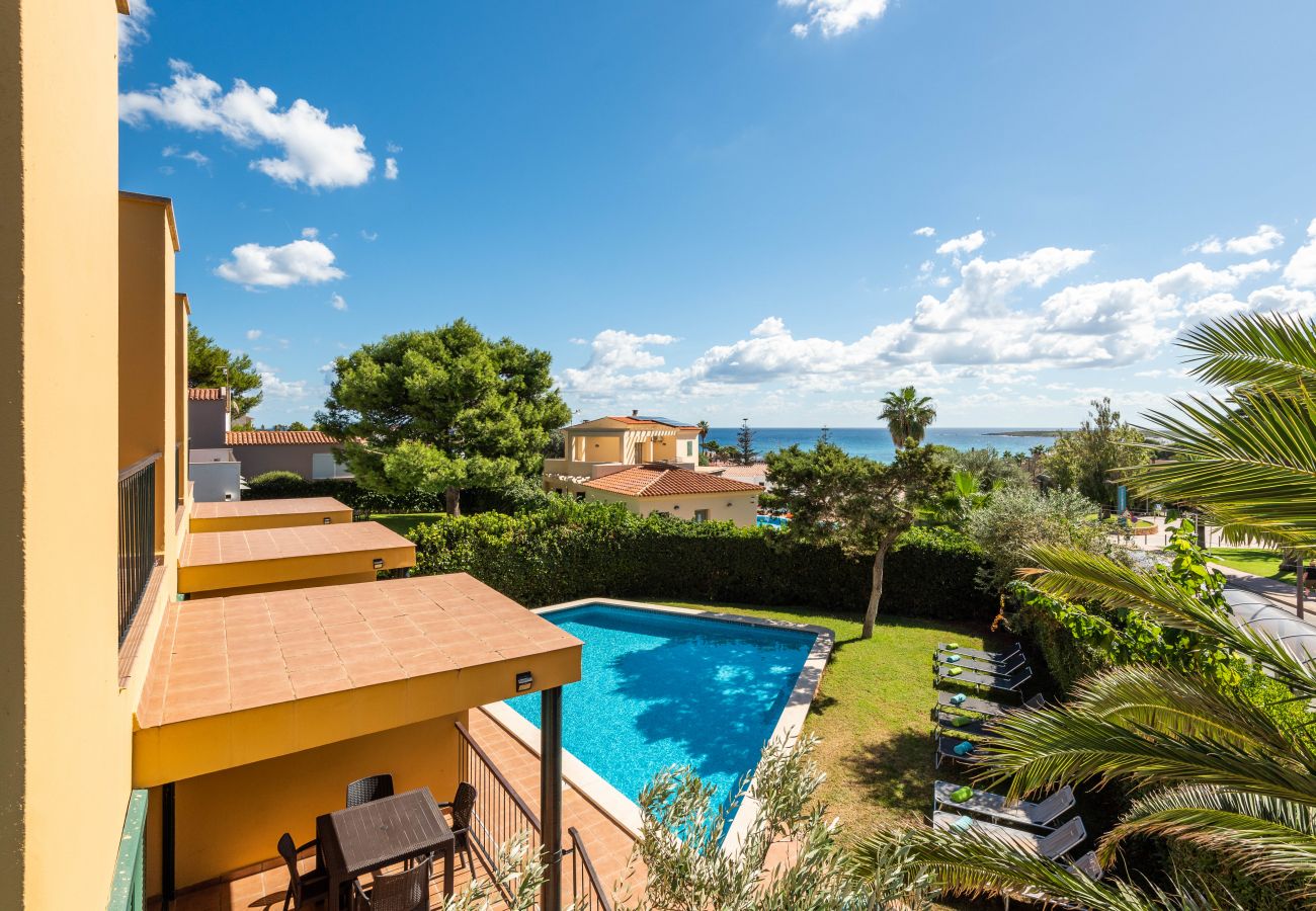 Apartamentos Punta Prima By EscapeHome, Piscina jardin Piscina jardín